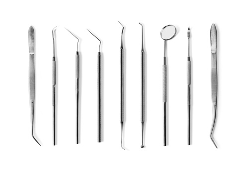 A set of dentist tools isolated on a white background with clipping path