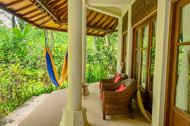 istock terrace with hammock in front of jungle 454410705
