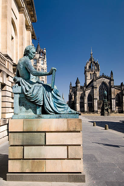 istock David Hume Statue with St. Giles Cathedral, Edinburgh, Scotland, UK 454410907