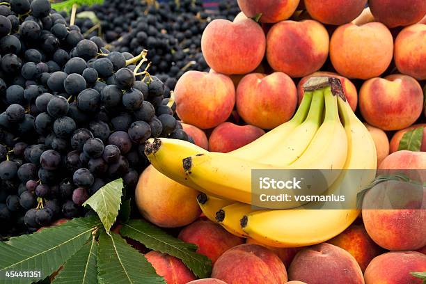 Peach Grape And Banana Stock Photo - Download Image Now - Backgrounds, Banana, Black Color