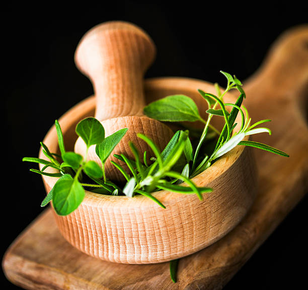 istock Fresh Organic Rosemary and Oregano in Mortar 454418963