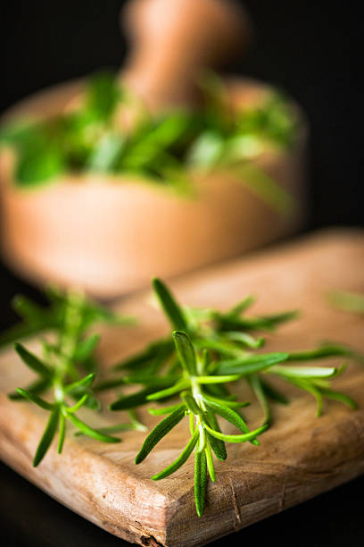 istock Fresh Organic Rosemary with Mortar and Pestle 454419085