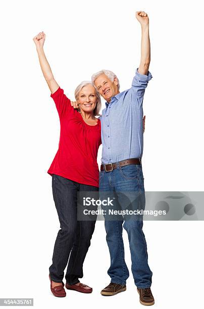 Photo libre de droit de Couple Senior Acclamations Avec Poingsisolé Tenir Fermement banque d'images et plus d'images libres de droit de Lever la main