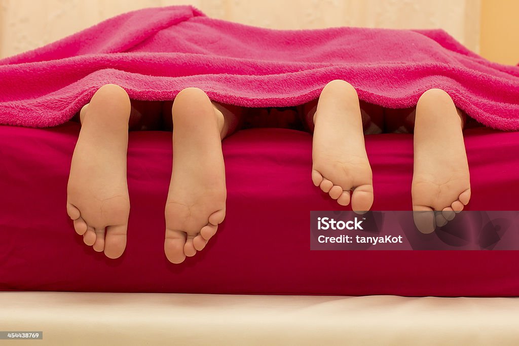 soles of the feet soles of the feet of childrens Adult Stock Photo