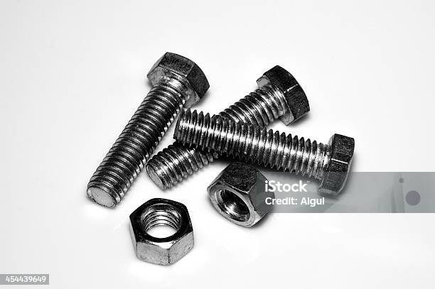 Bolts And Nuts Stock Photo - Download Image Now - Alloy, Backgrounds, Bolt - Fastener