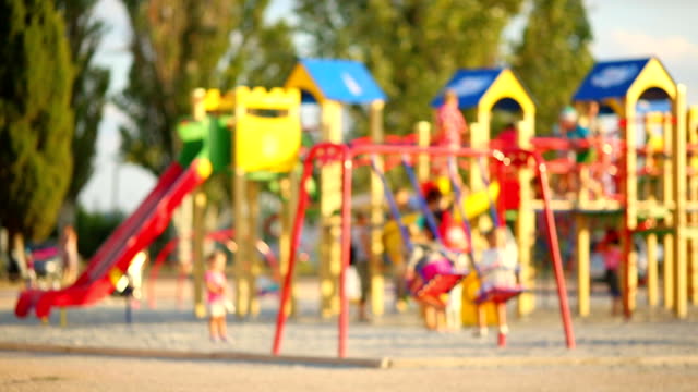 children playing in the playground - defocus