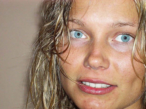 Portrait of a teen with blue eyes looking at you