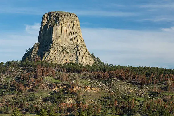 A rock formation on a hill.