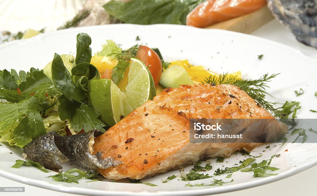 Baked salmon Smoked salmon withlime and parsley Baked Stock Photo