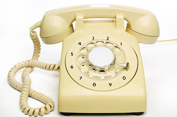 istock Old cream telephone 454926523