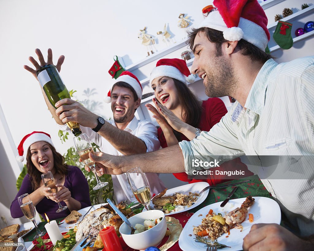 Celebrating new year Young people celebrating together new year's eve Adult Stock Photo