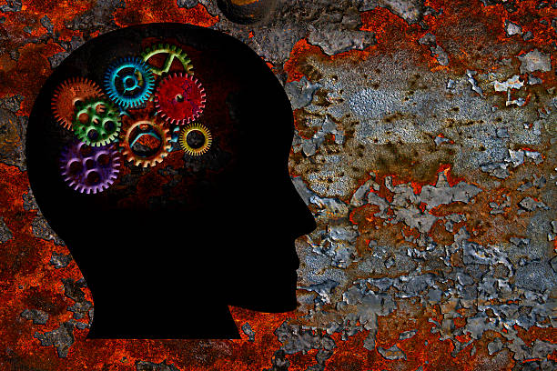 istock Rusty Gears on Human Head Grunge Texture Background 454930339