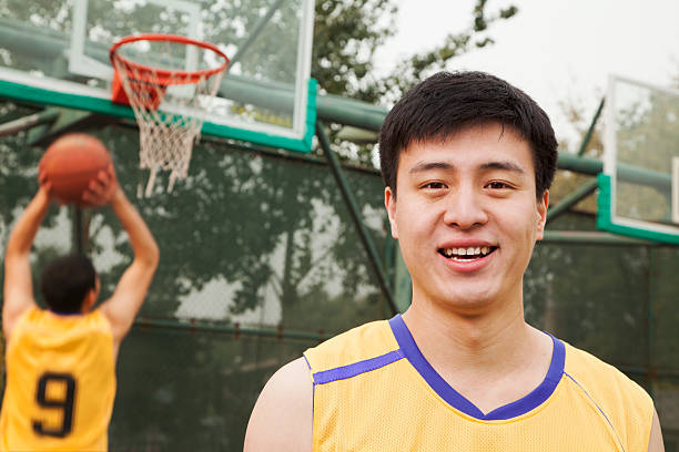 istock Teammates playing basketball 454931915
