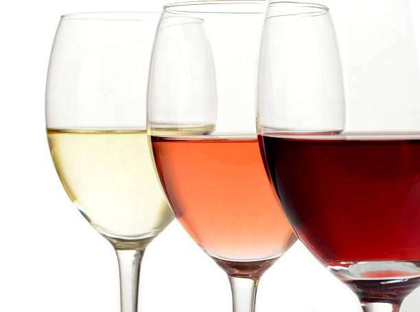 Glasses of white, rose and red wine White, rose and red wine in glasses on white background beaujolais region stock pictures, royalty-free photos & images