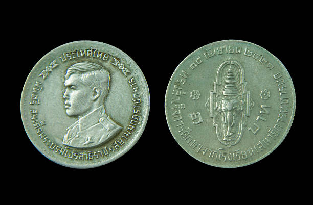 istock Old coins in Thailand 454934869