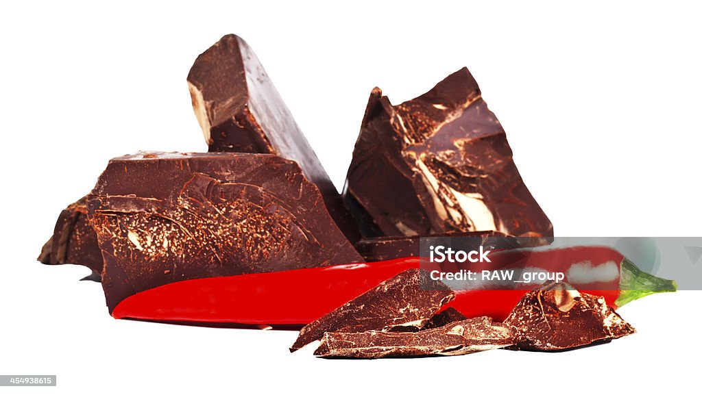 Heap of delicious black chocolate with red chili pepper Arrangement Stock Photo