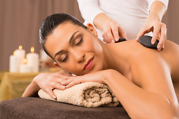 istock Hot Stone Massage Of A Young Woman 454939051