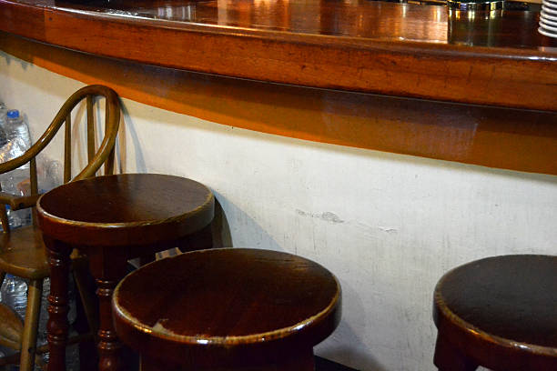 istock Brown seats of a bar 454942045