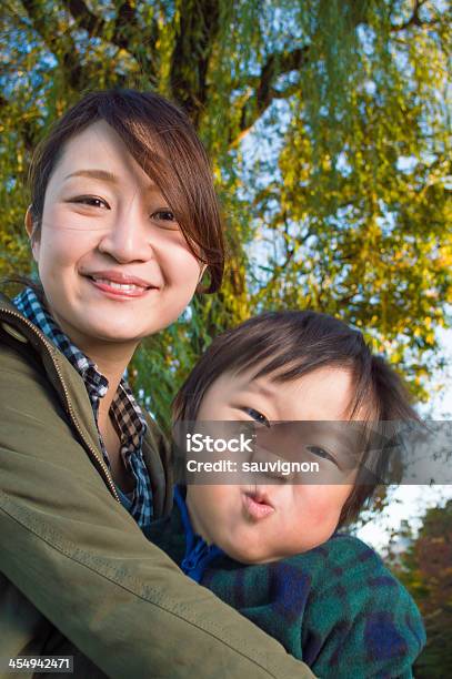 Istockalypse2013tokyoparent And Child Funnypleasant Expression Stock Photo - Download Image Now