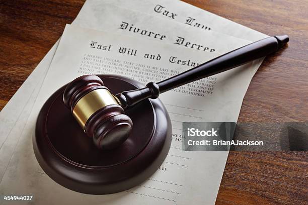 Judges Gavel Atop A Stack Of Court Documents Stock Photo - Download Image Now - Divorce, Will - Legal Document, Document