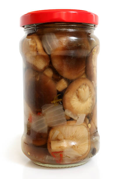 istock Mushrooms marinaded in glass jar 454944515