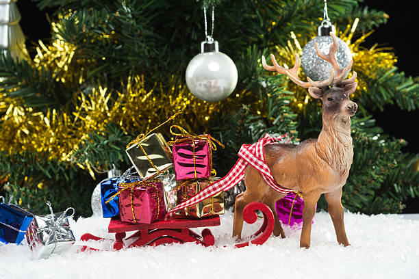 istock christmas gifts on sledge 454947299