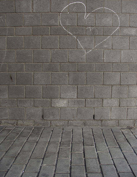 istock hand drawn white chalk love hearts on  wall 454947835