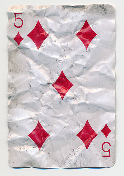 istock old crumpled five of diamonds playing card 454951695