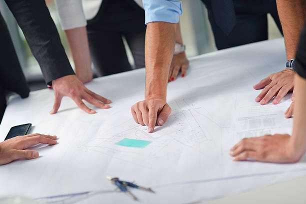 istock Business people and engineers talking at a meeting together 454951907