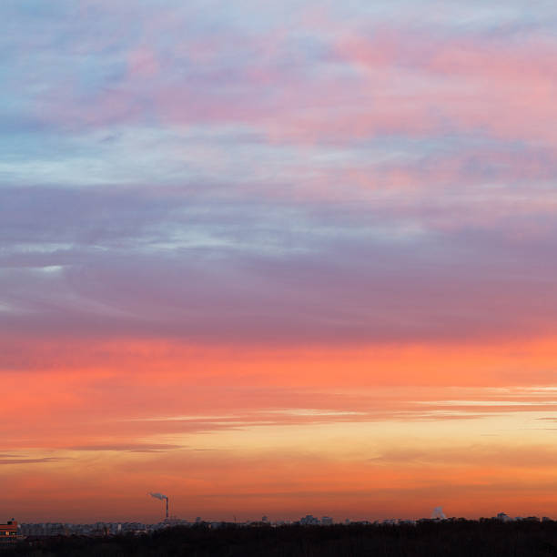 istock early sunrise sky with blue and pink clouds 454953219