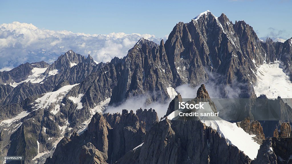 Green Needle Panorama Aiguille Verte from the Aiguille du Midi, French Alps. Aiguille de Midi Stock Photo