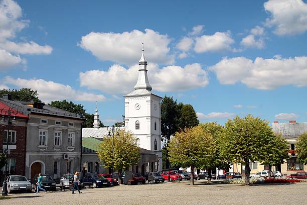 market square,houses and old church in Zmigrod Nowy stock photo