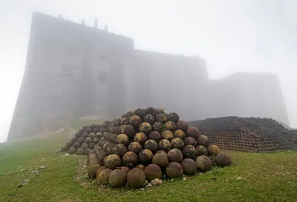 Citadelle Laferriere in the fog with the artillery in the foreground, Northern Haiti