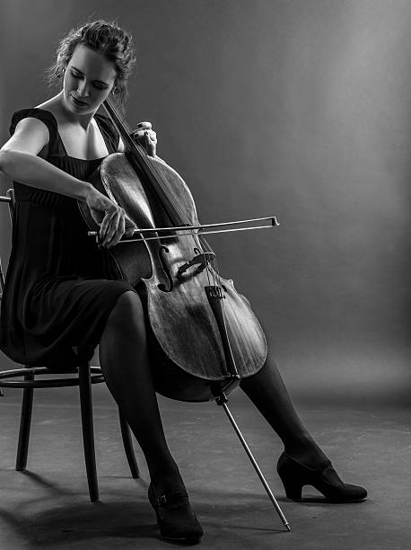 istock Woman playing the cello black and white 454964657