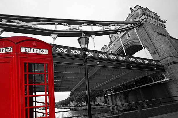 istock Tower Bridge with typical red telephone box in London, England 454964995