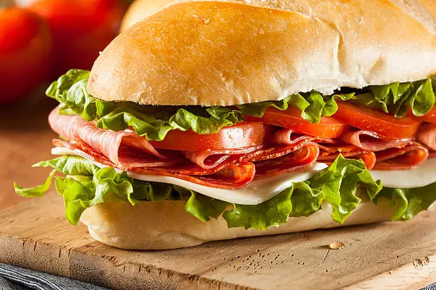 Homemade Italian Sub Sandwich with Salami, Tomato, and Lettuce