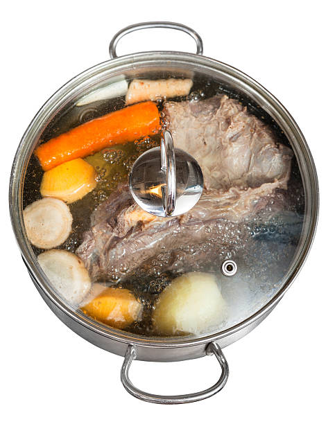 istock simmer of beef broth in steel pan 454965269