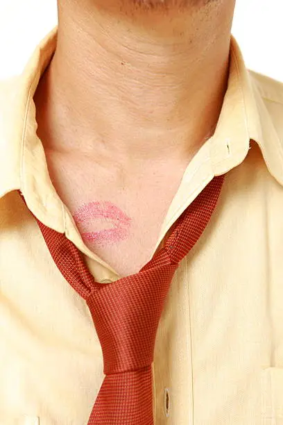 man with lipstick mark.