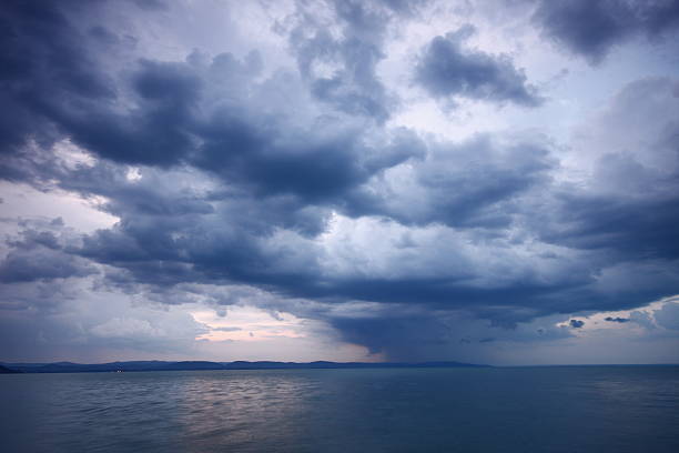 буря на озеро балатон - incoming storm стоковые фото и изображения