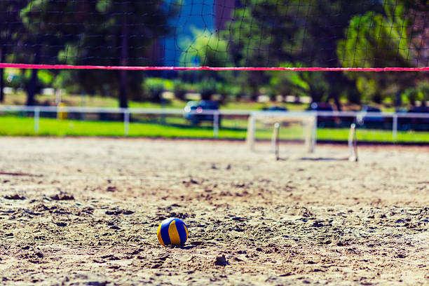 Empty beach volleyball playground at seaside resort.