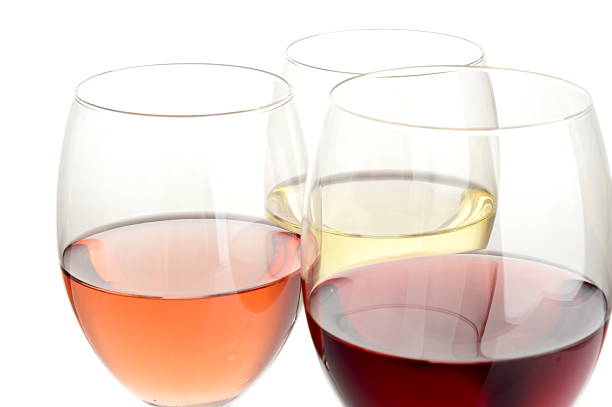 istock Glasses of rose, white and red wine 454971535