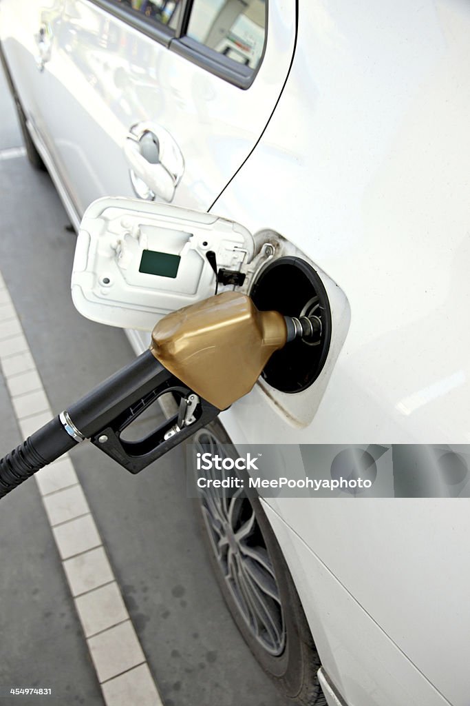 White cars are fuel filler. The Picture White cars are fuel filler in Gas station. Air Valve Stock Photo