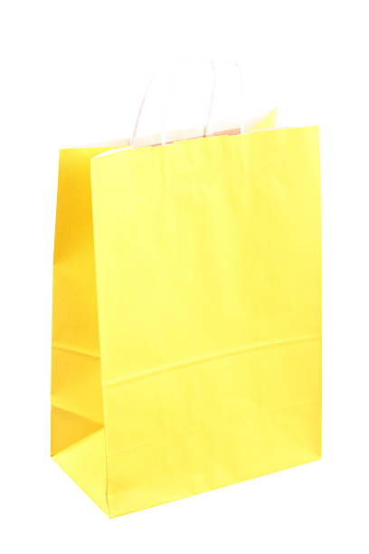 istock Shopping yellow gift bags and apple isolated 454977265