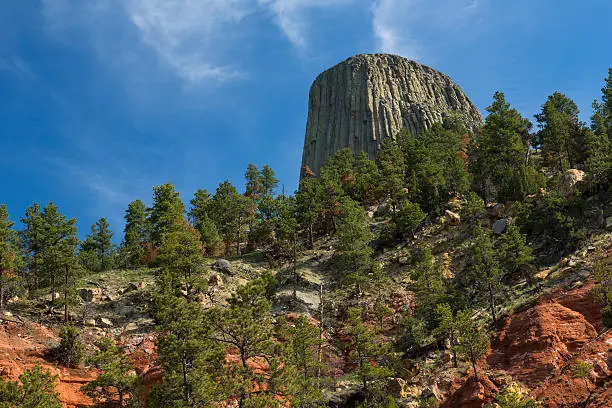 A rock formation on top of a hill.