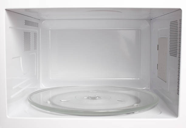 Microwave oven inside view Microwave oven inside view inside microwave stock pictures, royalty-free photos & images