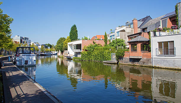 istock Mechelen - Canal and yachts in morning light 454980077