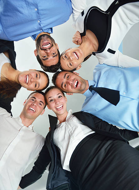 istock business people with their heads together 454984337