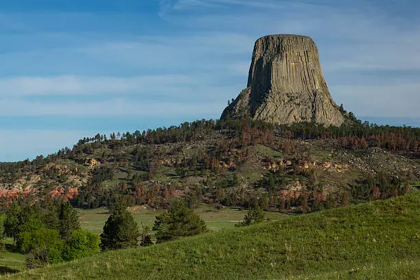 A rock formation on a hill.