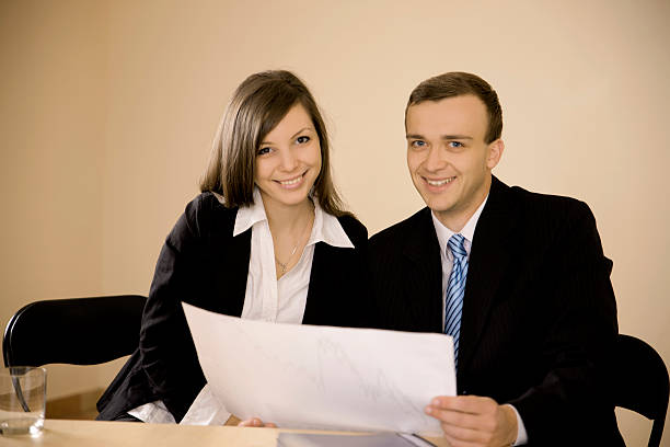 istock Young business people looking at camera 454985665
