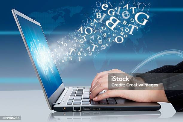 Hands Working On A Laptop Representing Online Business Stock Photo - Download Image Now